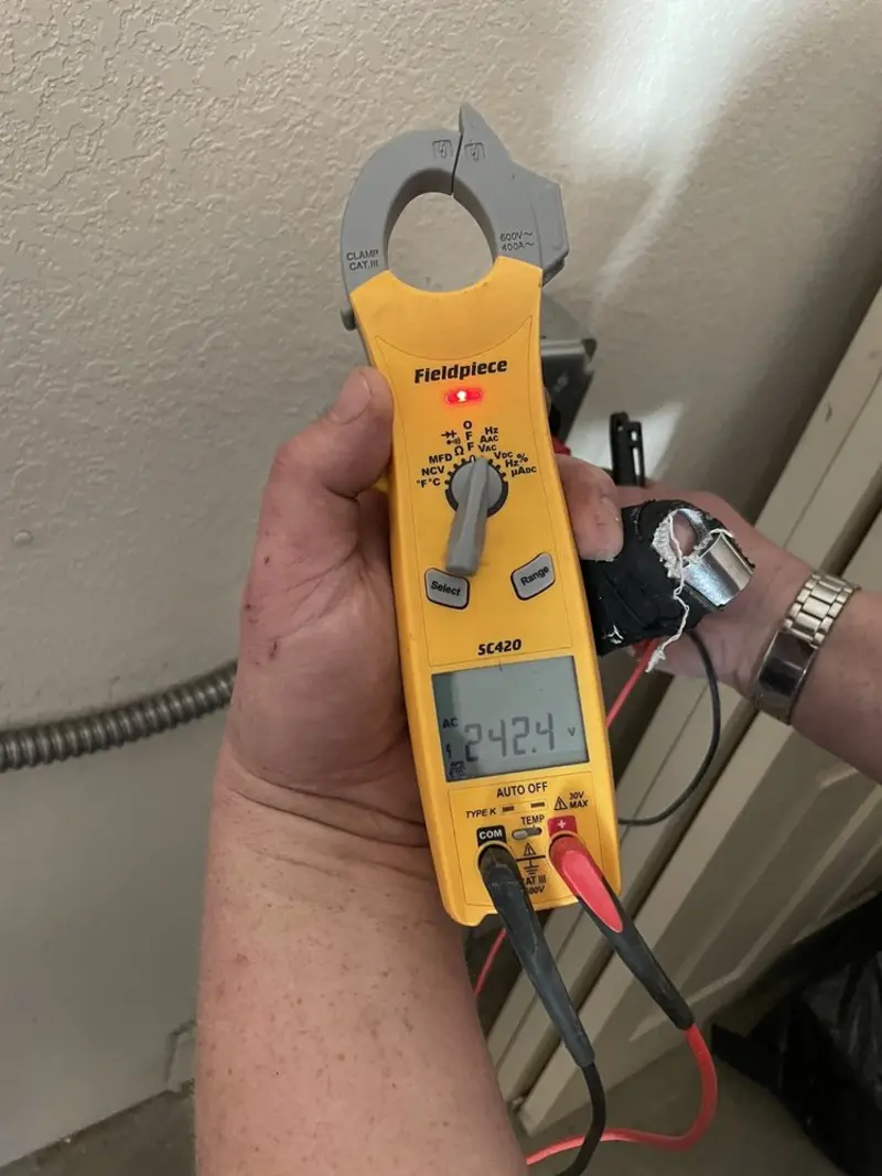 Voltage testing with clamp meter during Circuit Breaker Repair in Thompson